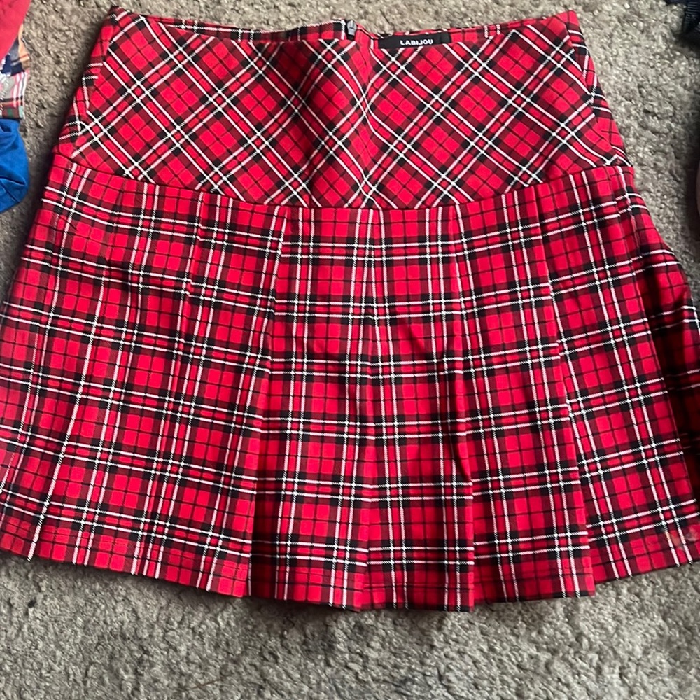 Red pleated skirt